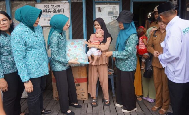 TP PKK Kota Palangka Raya Salurkan Bantuan untuk Korban Kebakaran di Puntun